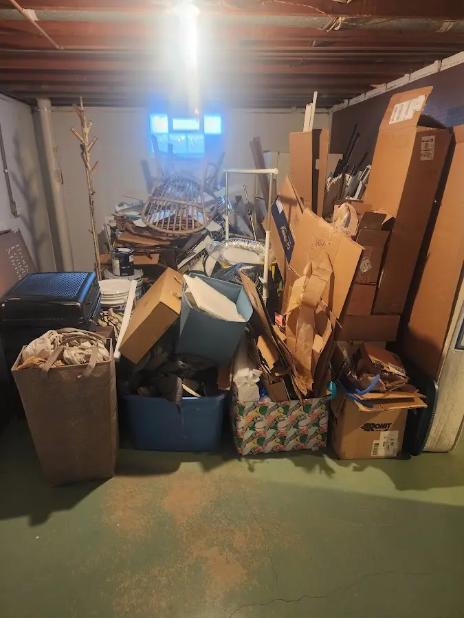 Roll-off dumpster container at job site for 20 Yard Dumpster Rental in Lewiston